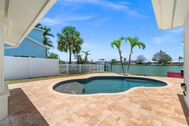 600 115th Ave, Treasure Island, FL 33706 - view of pool featuring a patio, a water view, and a fenced backyard