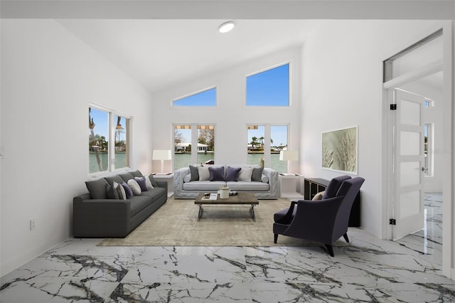 600 115th Ave, Treasure Island, FL 33706 - living area with marble tiled floors, a water view, and high vaulted ceiling