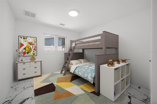 600 115th Ave, Treasure Island, FL 33706 - bedroom featuring marble look tiles