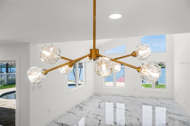 600 115th Ave, Treasure Island, FL 33706 - detailed view of recessed lighting and a chandelier