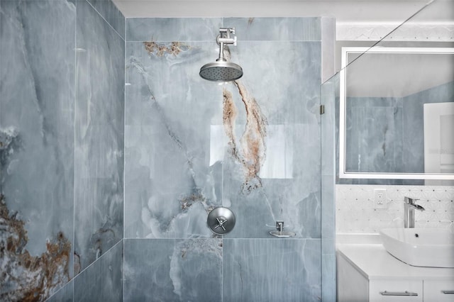 600 115th Ave, Treasure Island, FL 33706 - full bathroom with a marble finish shower, tile walls, and vanity