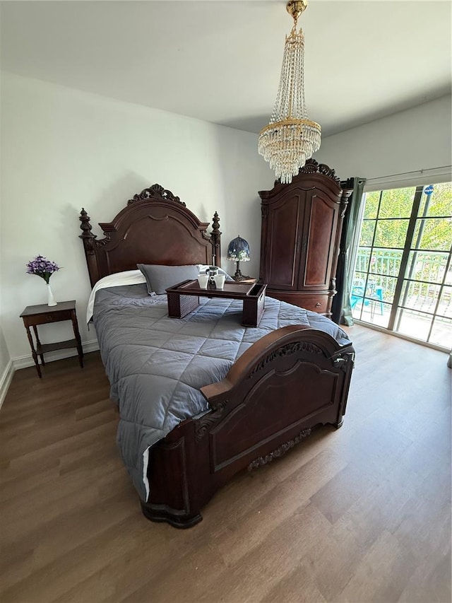 2924 Hidden Harbour Ct, Fort Lauderdale, FL 33312 - bedroom with access to outside, wood finished floors, and a chandelier