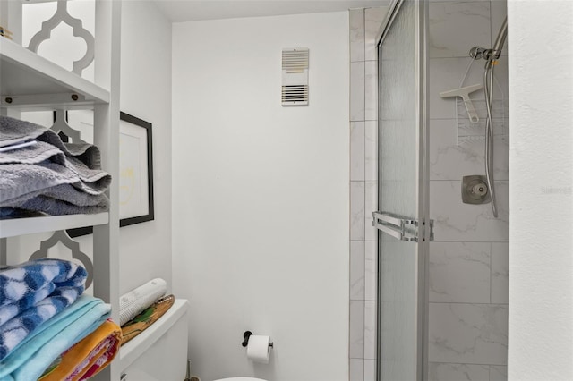 1230 Gulf Blvd Unit 1406, Clearwater Beach, FL 33767 - bathroom featuring toilet and a shower stall