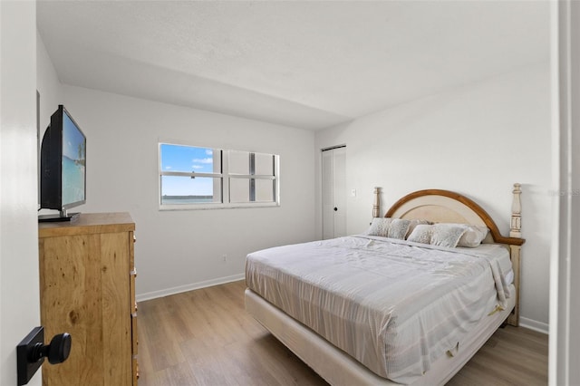 1230 Gulf Blvd Unit 1406, Clearwater Beach, FL 33767 - bedroom with wood finished floors
