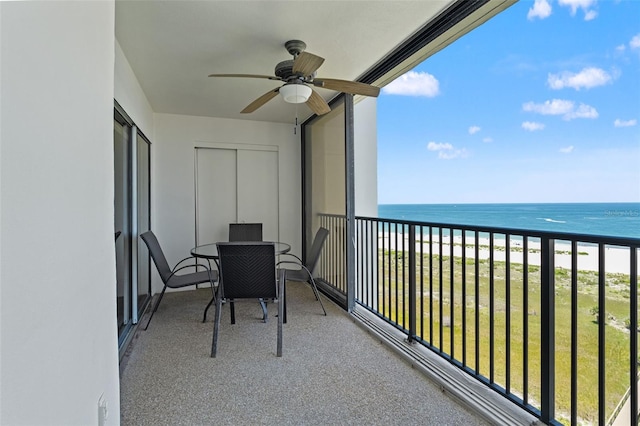 1230 Gulf Blvd Unit 1406, Clearwater Beach, FL 33767 - balcony featuring ceiling fan and view of water and beach