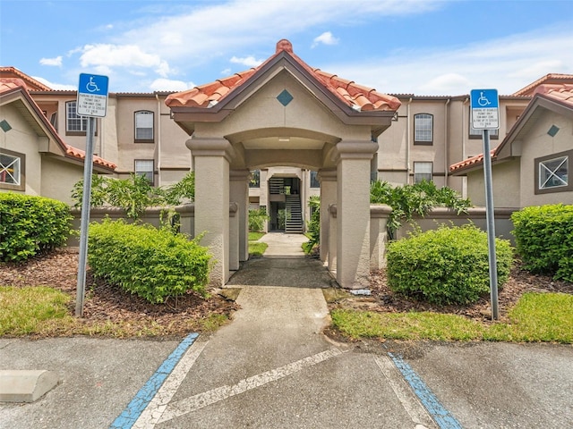 18107 Peregrines Perch Pl Unit 6302, Lutz, FL 33558 - view of building exterior with stairway
