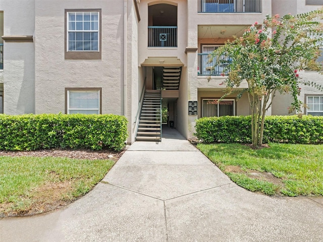 18107 Peregrines Perch Pl Unit 6302, Lutz, FL 33558 - view of property with stairway