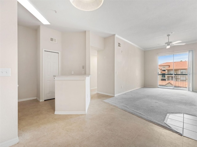 18107 Peregrines Perch Pl Unit 6302, Lutz, FL 33558 - unfurnished room featuring a ceiling fan and ornamental molding
