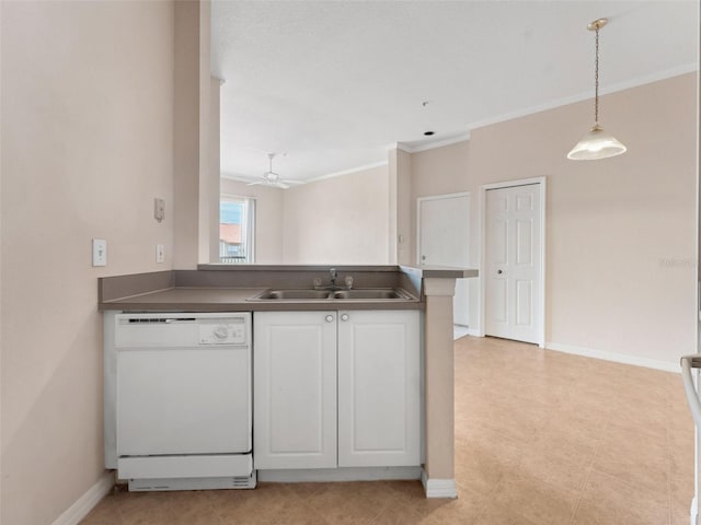 18107 Peregrines Perch Pl Unit 6302, Lutz, FL 33558 - kitchen featuring dishwasher, crown molding, white cabinets, a peninsula, and hanging light fixtures