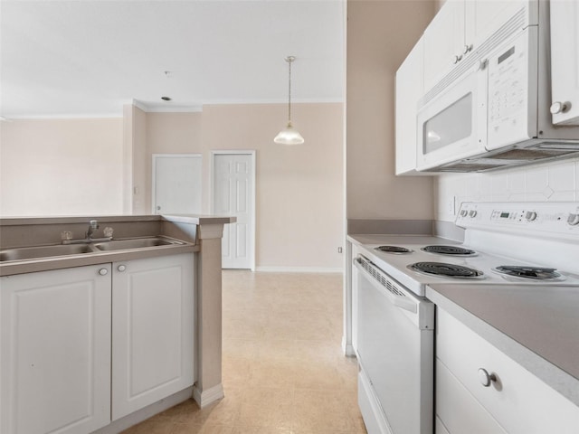 18107 Peregrines Perch Pl Unit 6302, Lutz, FL 33558 - kitchen with white appliances, white cabinetry, ornamental molding, hanging light fixtures, and light countertops