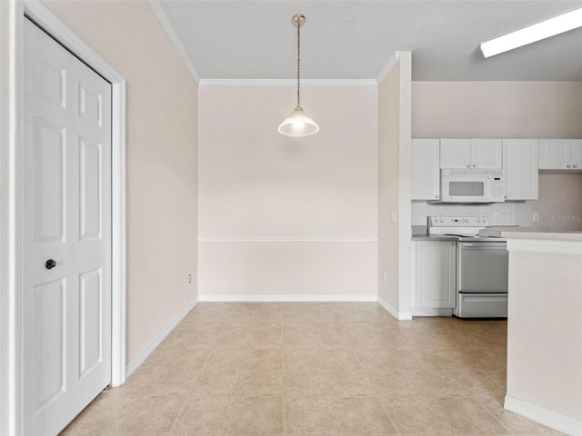 18107 Peregrines Perch Pl Unit 6302, Lutz, FL 33558 - kitchen with white appliances, white cabinets, ornamental molding, decorative light fixtures, and light countertops