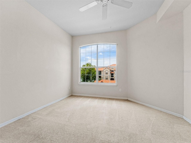 18107 Peregrines Perch Pl Unit 6302, Lutz, FL 33558 - spare room featuring carpet flooring and ceiling fan