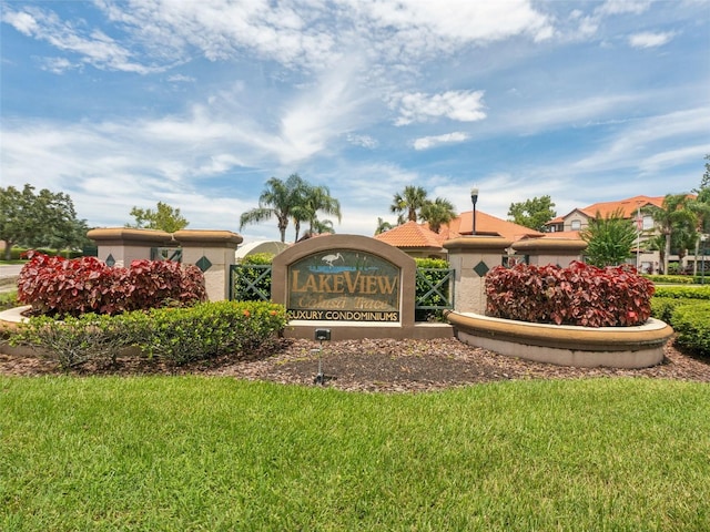 18107 Peregrines Perch Pl Unit 6302, Lutz, FL 33558 - community sign with a lawn