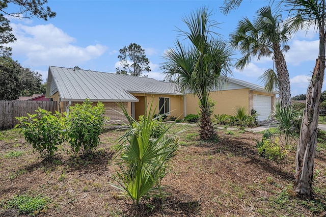 1902 Cedarbrooke Dr, Lutz, FL 33549 - view of front of house featuring brick siding and a garage