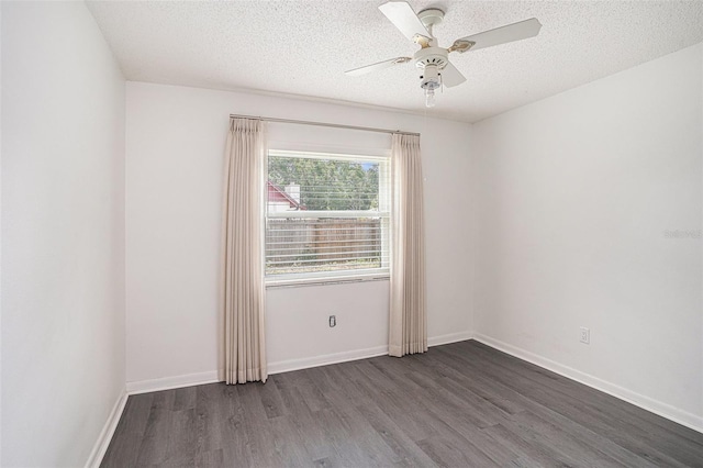 1902 Cedarbrooke Dr, Lutz, FL 33549 - spare room featuring wood finished floors, a ceiling fan, and a textured ceiling