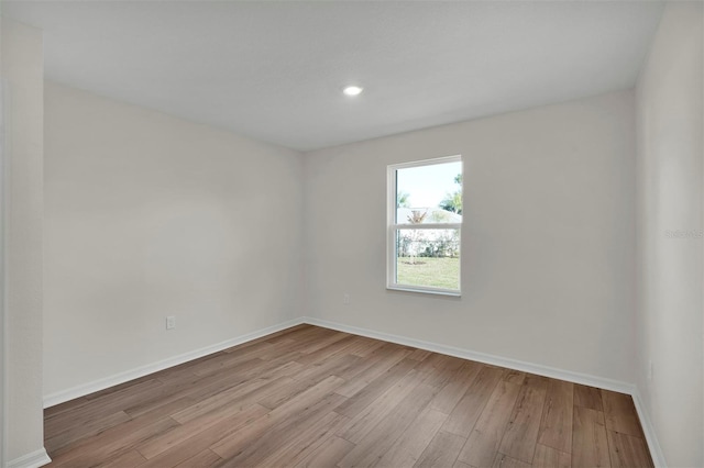 7504 SW 128th St, Ocala, FL 34473 - unfurnished room with wood finished floors and recessed lighting