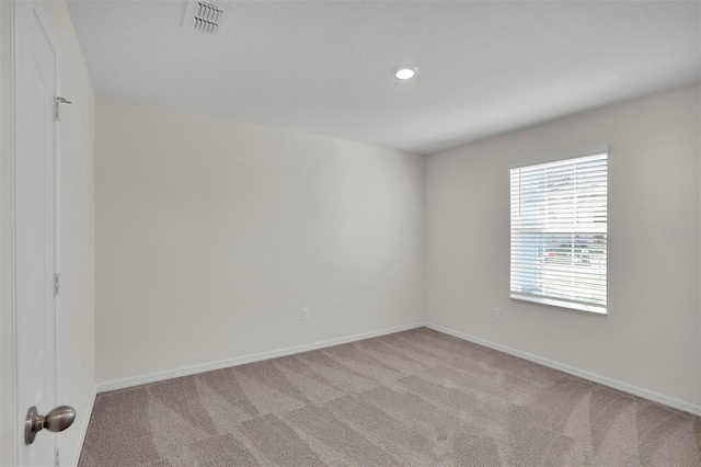 7504 SW 128th St, Ocala, FL 34473 - unfurnished room with carpet floors and recessed lighting