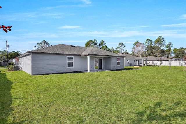 7504 SW 128th St, Ocala, FL 34473 - rear view of property featuring roof with shingles