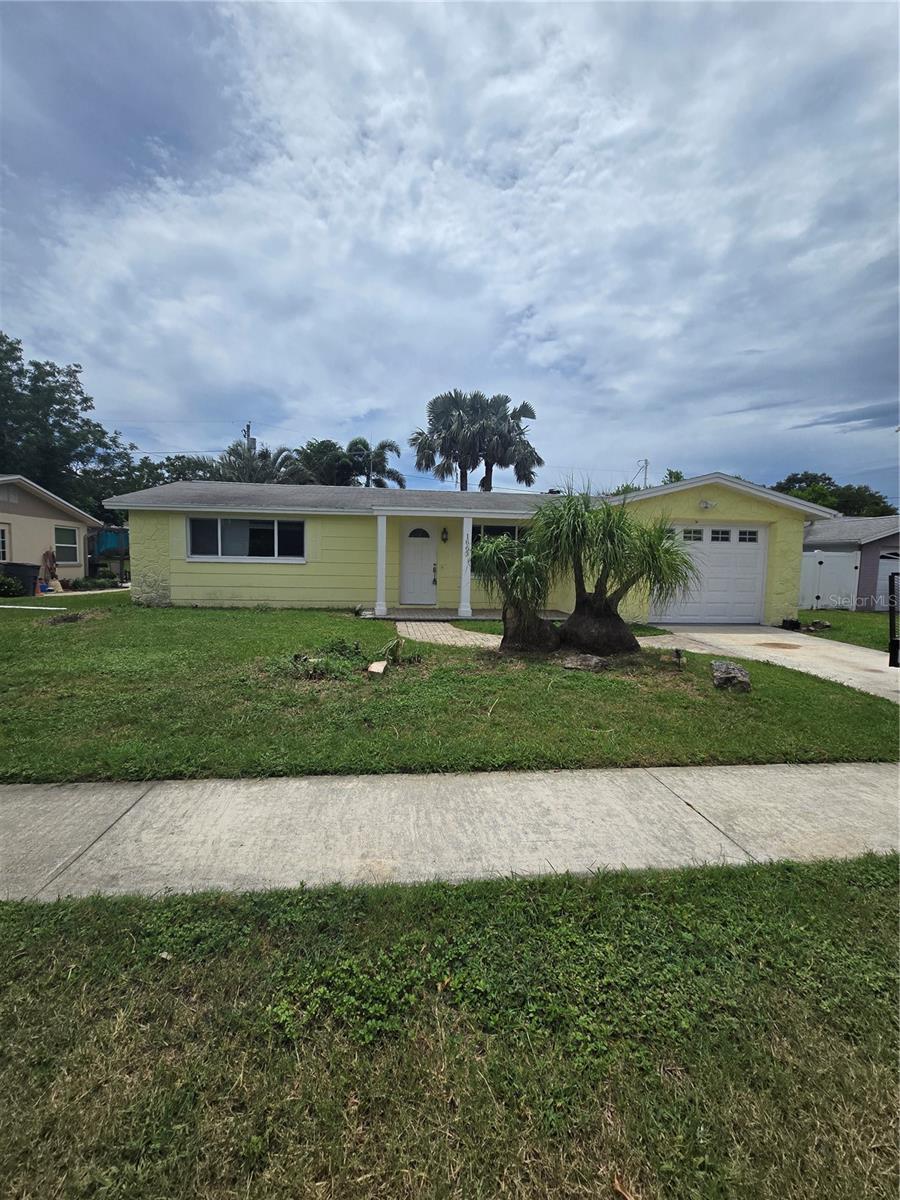 1663 Plum Tree Rd, Holiday, FL 34690 - photo 1