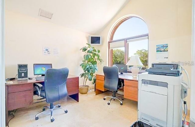 home office featuring high vaulted ceiling