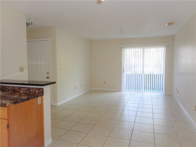 view of tiled empty room