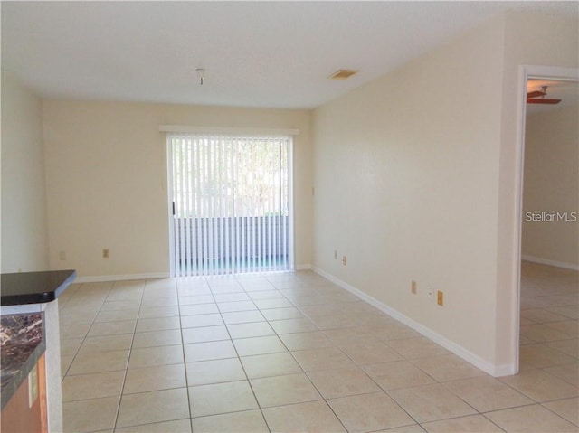 view of tiled empty room