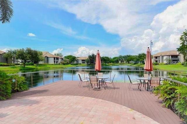 view of patio with a water view