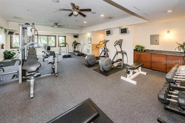 workout area with ceiling fan