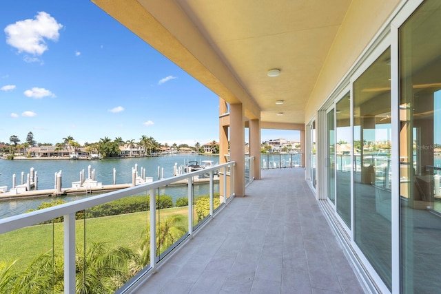 balcony featuring a water view