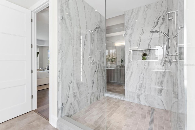 bathroom with a tile shower