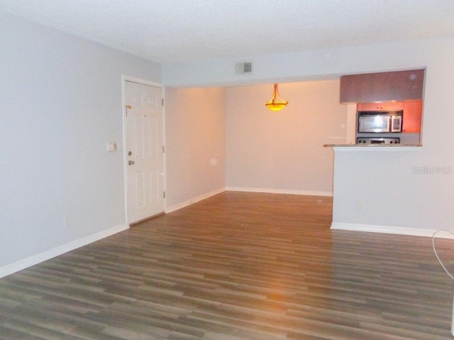 interior space featuring dark hardwood / wood-style flooring