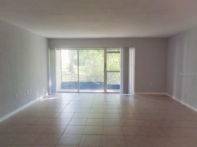 empty room with light tile flooring