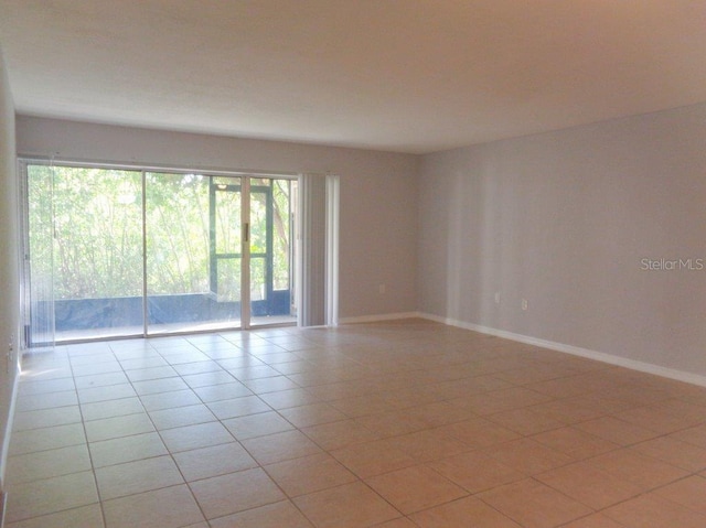 view of tiled spare room