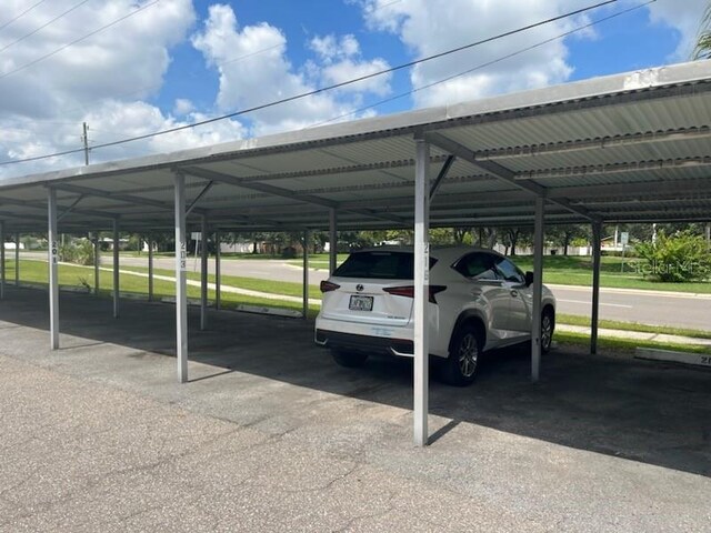 view of parking featuring a carport