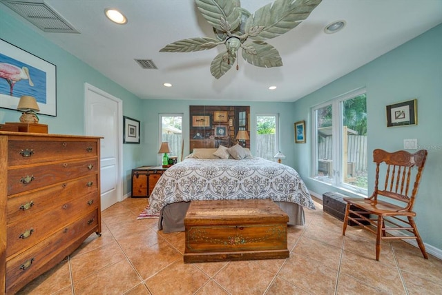 tiled bedroom with ceiling fan