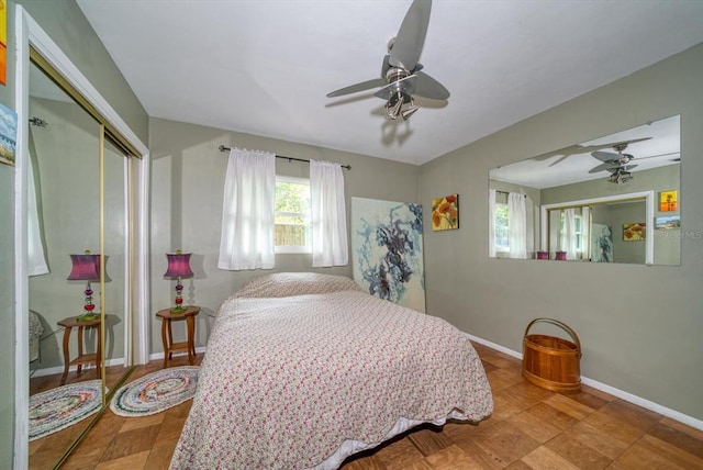 bedroom featuring a closet and ceiling fan