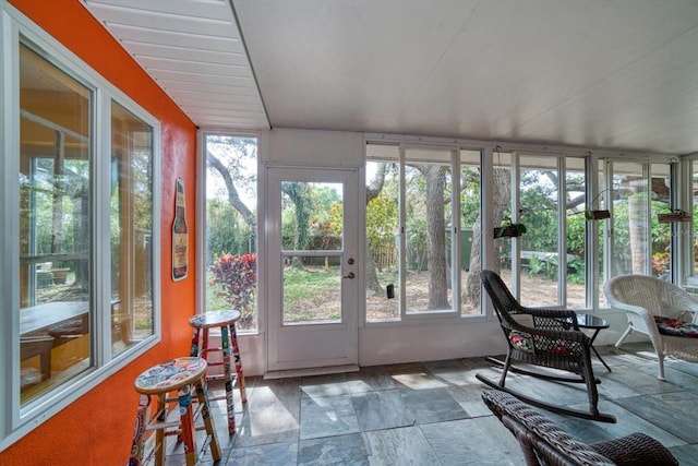 sunroom featuring plenty of natural light