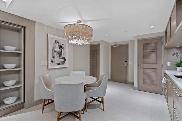 dining area with a notable chandelier