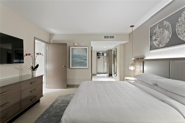 bedroom featuring light hardwood / wood-style flooring