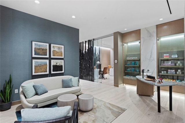 living area with light hardwood / wood-style flooring