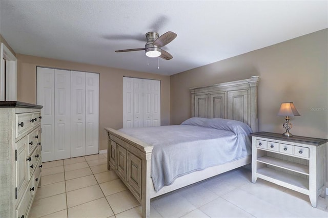 bedroom featuring light tile flooring and ceiling fan