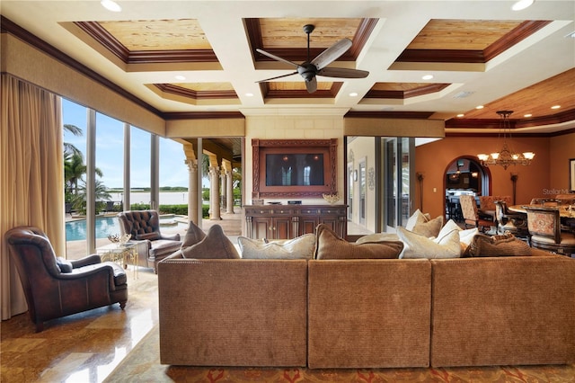 living room with ornamental molding, ceiling fan with notable chandelier, coffered ceiling, and beam ceiling