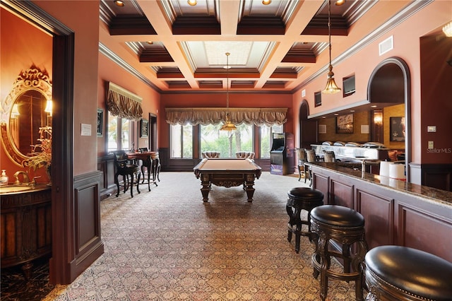 rec room with wet bar, pool table, coffered ceiling, and ornamental molding