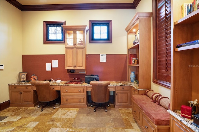 home office featuring built in desk and ornamental molding