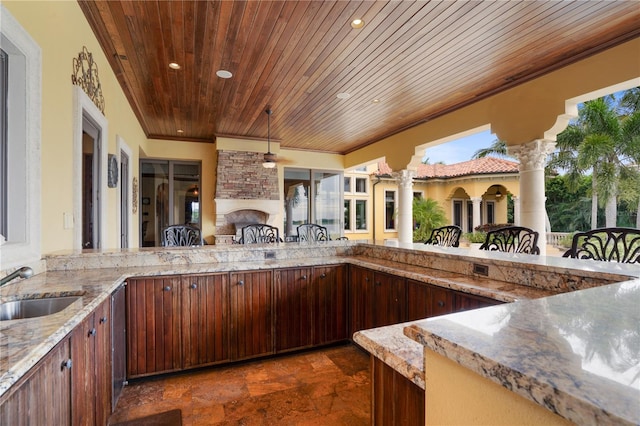 view of patio / terrace with an outdoor wet bar