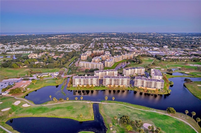 bird's eye view with a water view