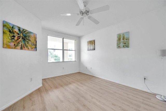 unfurnished room featuring light hardwood / wood-style floors and ceiling fan