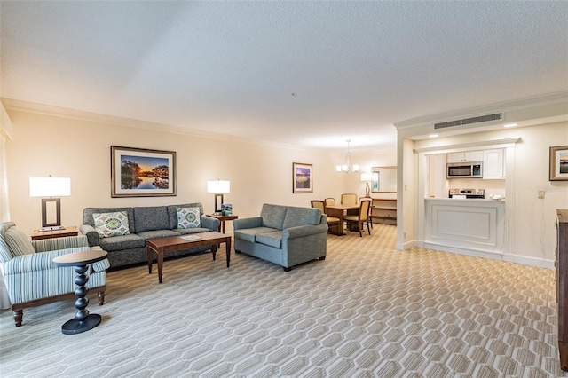 living area featuring light carpet, a chandelier, visible vents, and crown molding