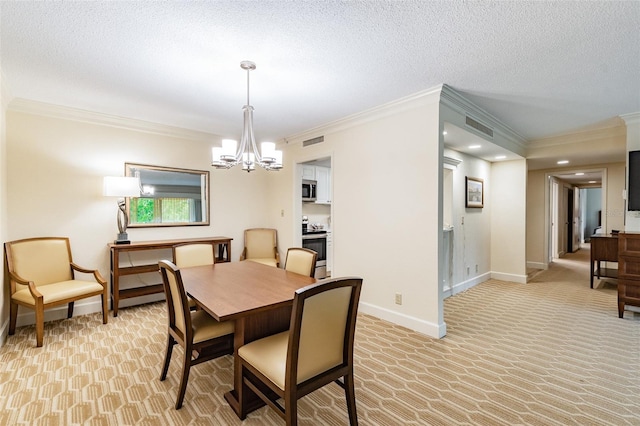 dining area featuring light carpet, a textured ceiling, a chandelier, and visible vents