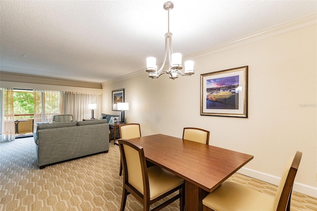 dining space with baseboards, a textured ceiling, ornamental molding, and a notable chandelier